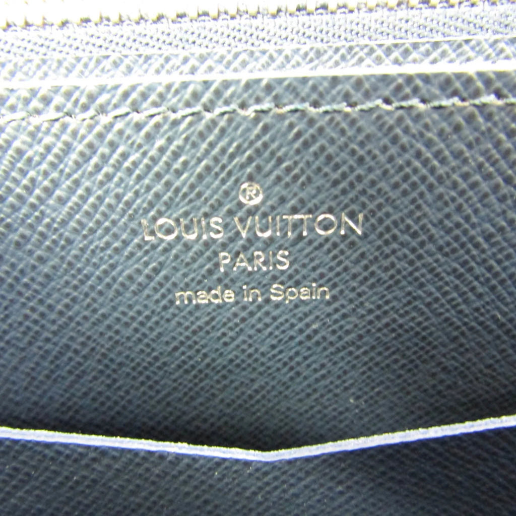 Pre-Owned Louis Vuitton Taiga Zippy  M64019 Men's Taiga Leather Long Wallet (bi-fold) Navy Blue (Good)