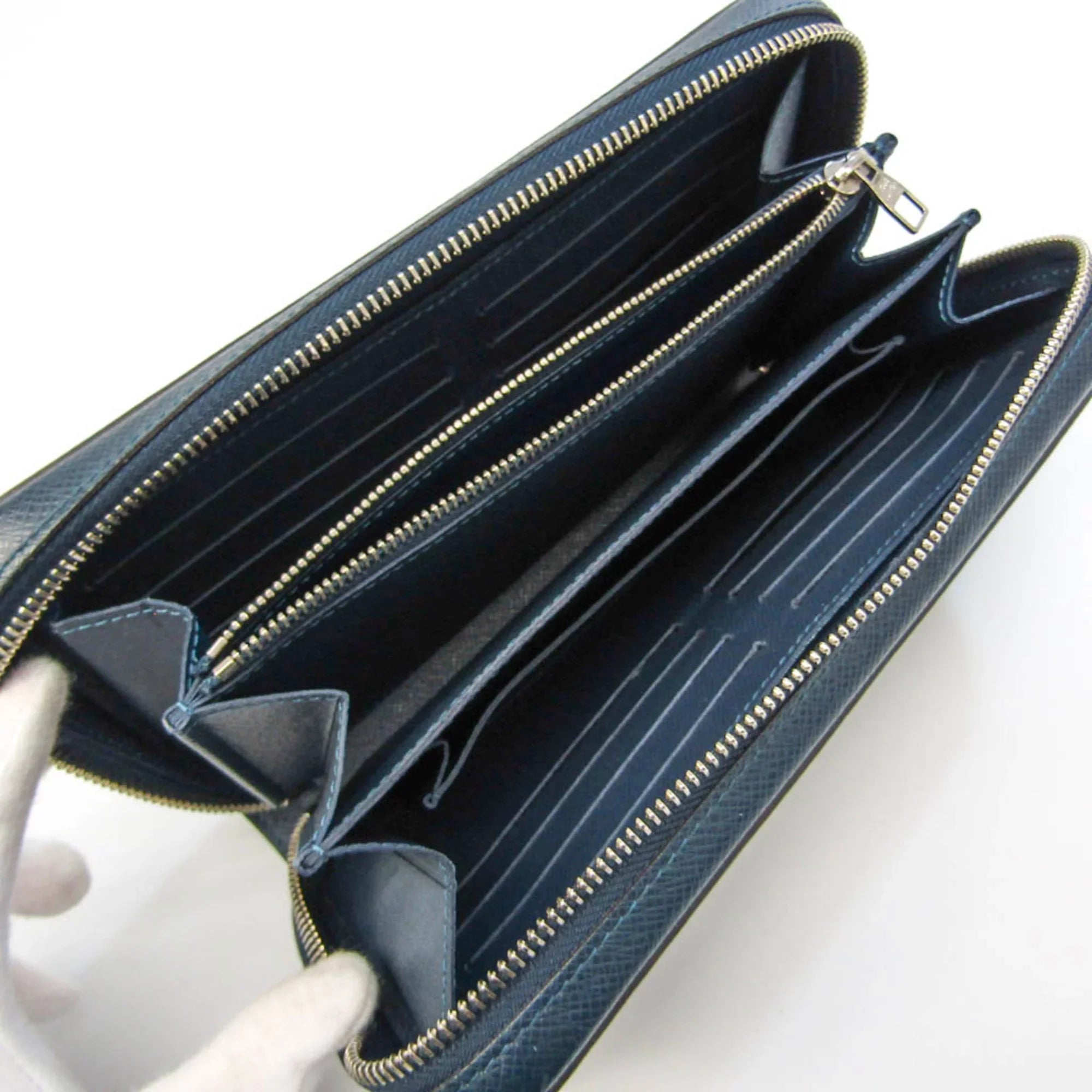 Pre-Owned Louis Vuitton Taiga Zippy  M64019 Men's Taiga Leather Long Wallet (bi-fold) Navy Blue (Good)