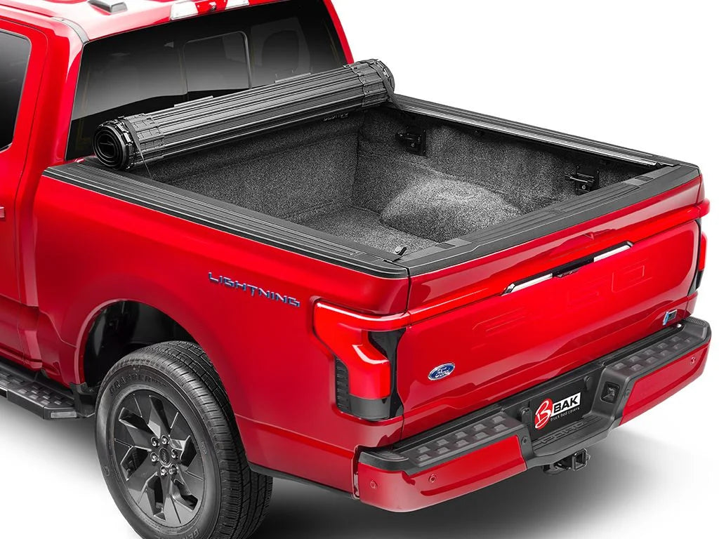 by RealTruck Revolver X4s Hard Rolling Truck Bed Tonneau Cover | 80338 | Compatible with 2021 - 2023 Ford F-150 8' 2" Bed (97.6")