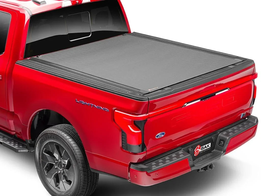 by RealTruck Revolver X4s Hard Rolling Truck Bed Tonneau Cover | 80338 | Compatible with 2021 - 2023 Ford F-150 8' 2" Bed (97.6")